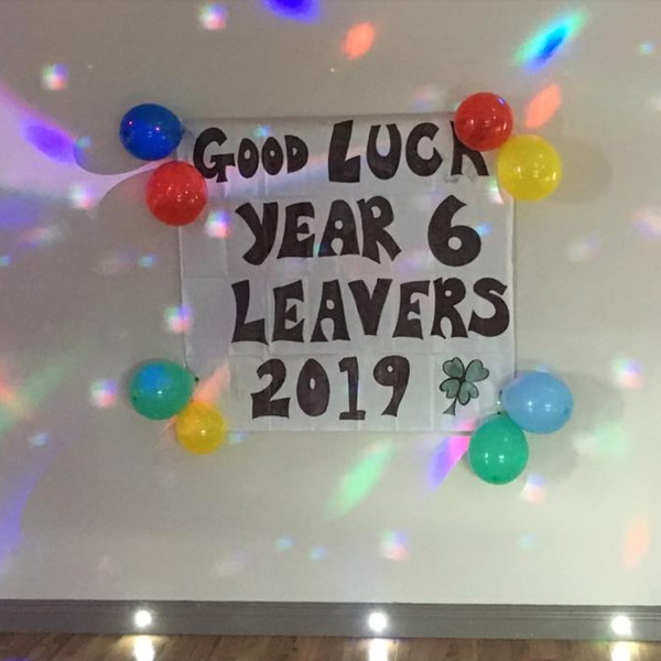 leaving school banner, balloons, disco lights, venue hire